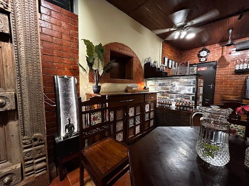 TLC Cafe | Specialty Coffee & Gourmet Pizzas